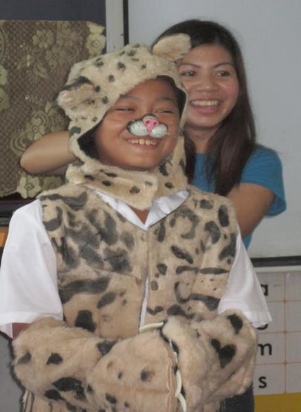 Teaching local students about clouded leopards